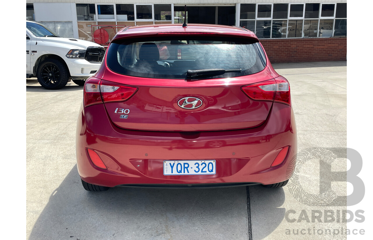 7/2014 Hyundai i30 SE GD MY14 5d Hatchback Red 1.8L