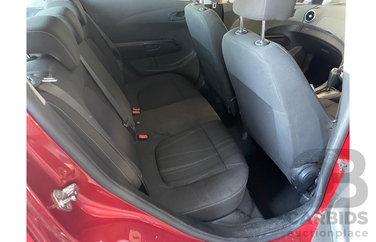 8/2012 Holden Barina  TM 5d Hatchback Red 1.6L