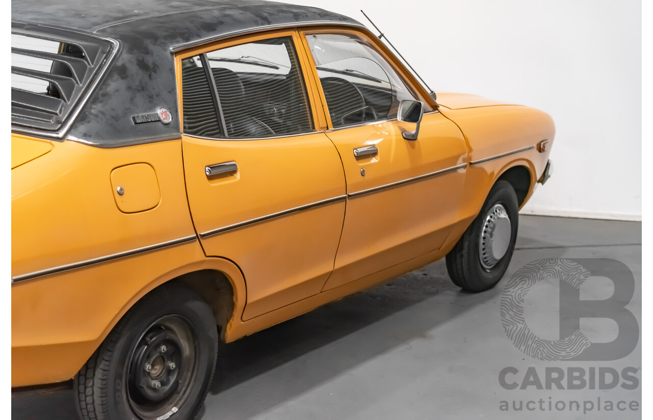 12/1976 Datsun 120y GL 4d Sedan Orange 1.2L