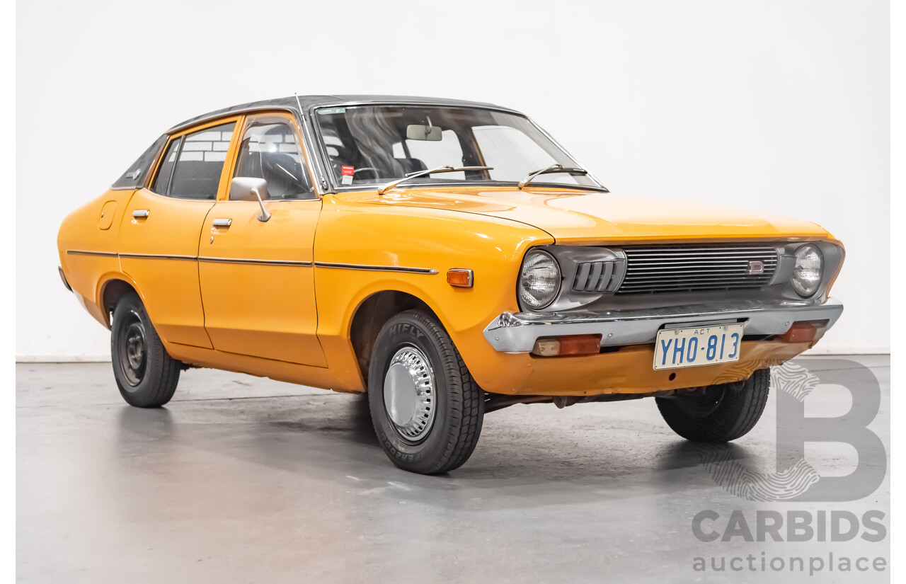 12/1976 Datsun 120y GL 4d Sedan Orange 1.2L