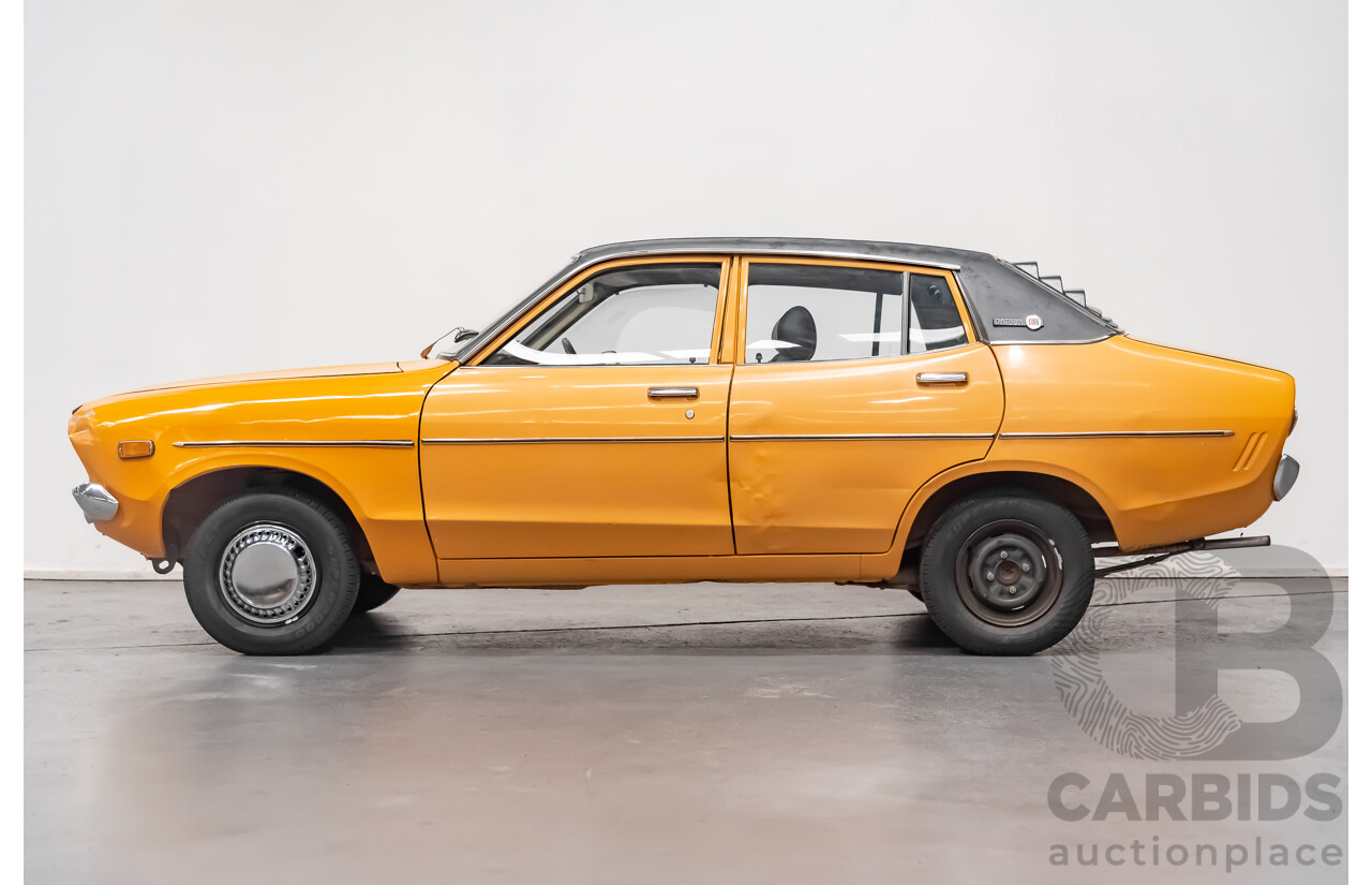 12/1976 Datsun 120y GL 4d Sedan Orange 1.2L