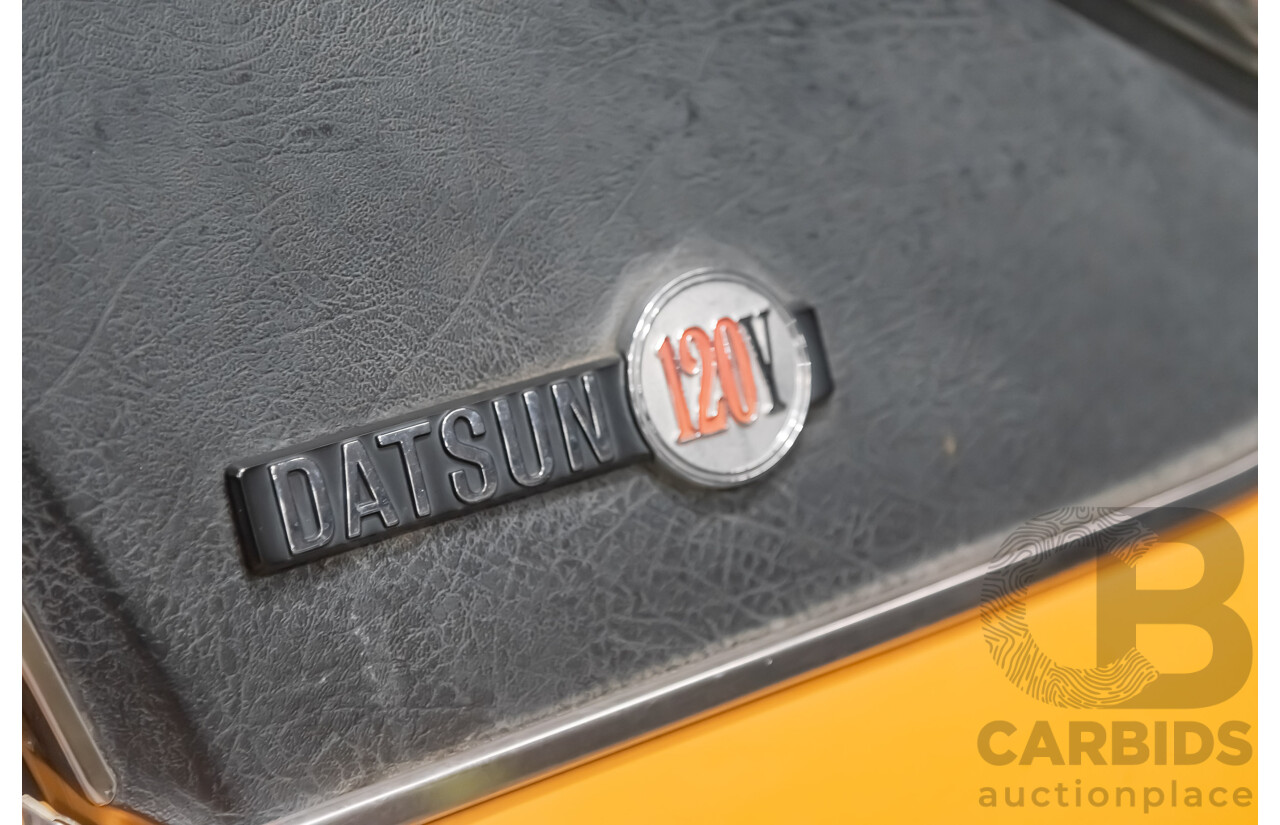 12/1976 Datsun 120y GL 4d Sedan Orange 1.2L