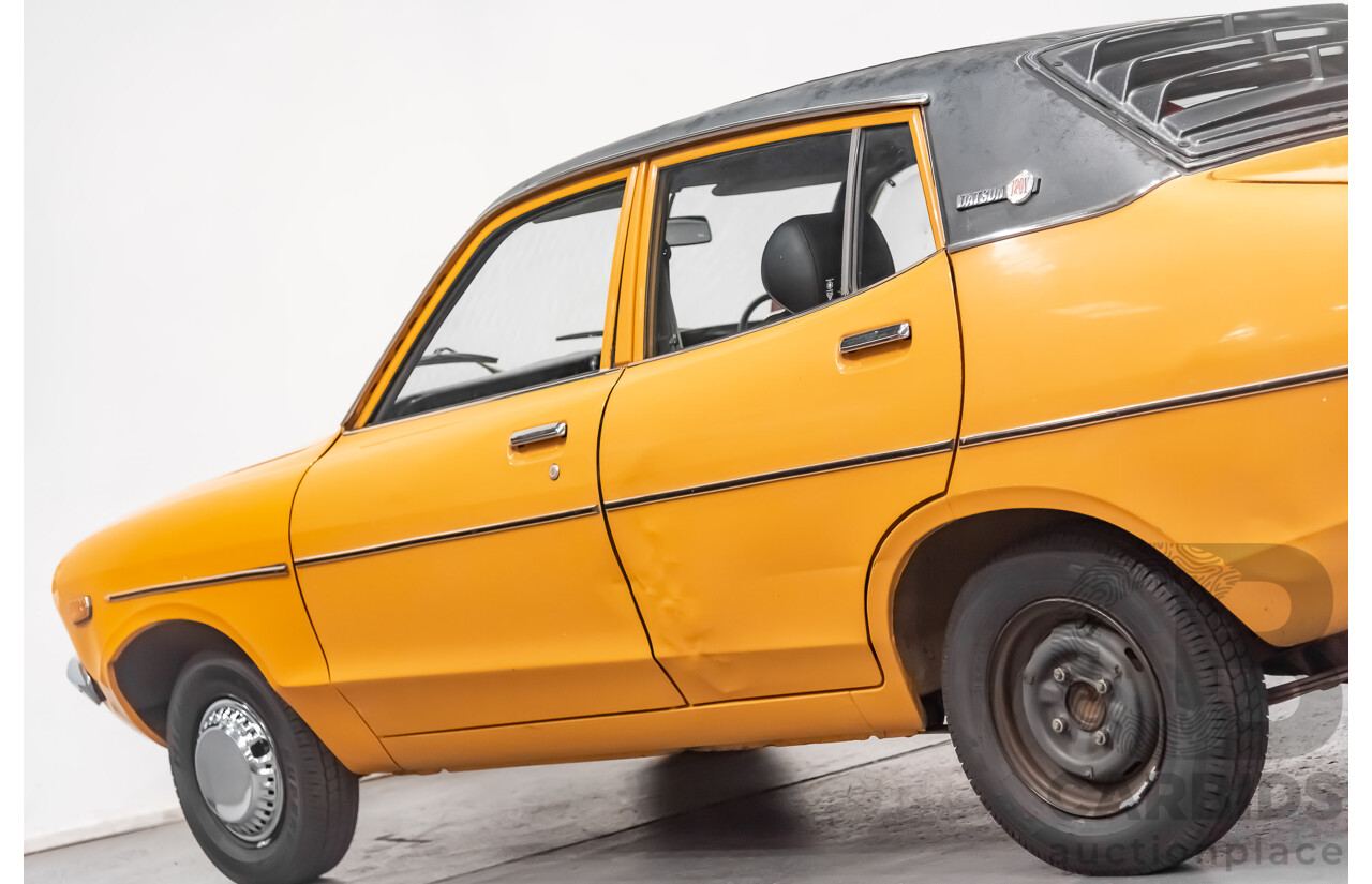 12/1976 Datsun 120y GL 4d Sedan Orange 1.2L