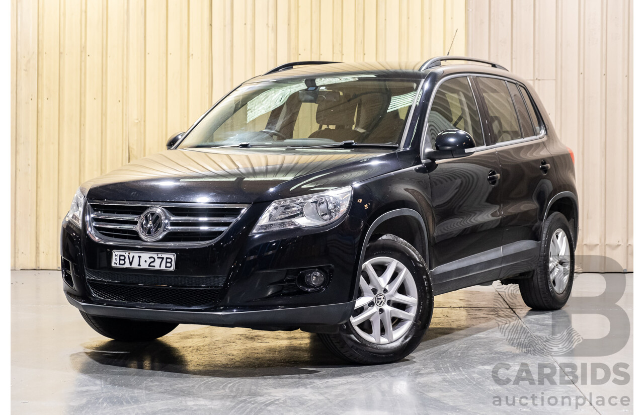 1/2011 Volkswagen Tiguan 125 TSI 4Motion (4x4) 5NC MY11 4d Wagon Black Turbo 2.0L