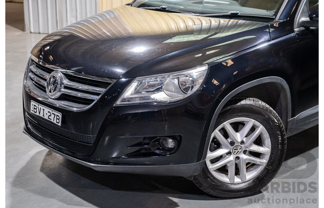 1/2011 Volkswagen Tiguan 125 TSI 4Motion (4x4) 5NC MY11 4d Wagon Black Turbo 2.0L