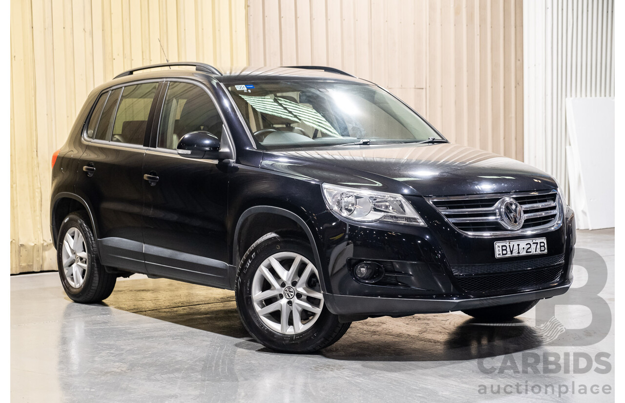 1/2011 Volkswagen Tiguan 125 TSI 4Motion (4x4) 5NC MY11 4d Wagon Black Turbo 2.0L