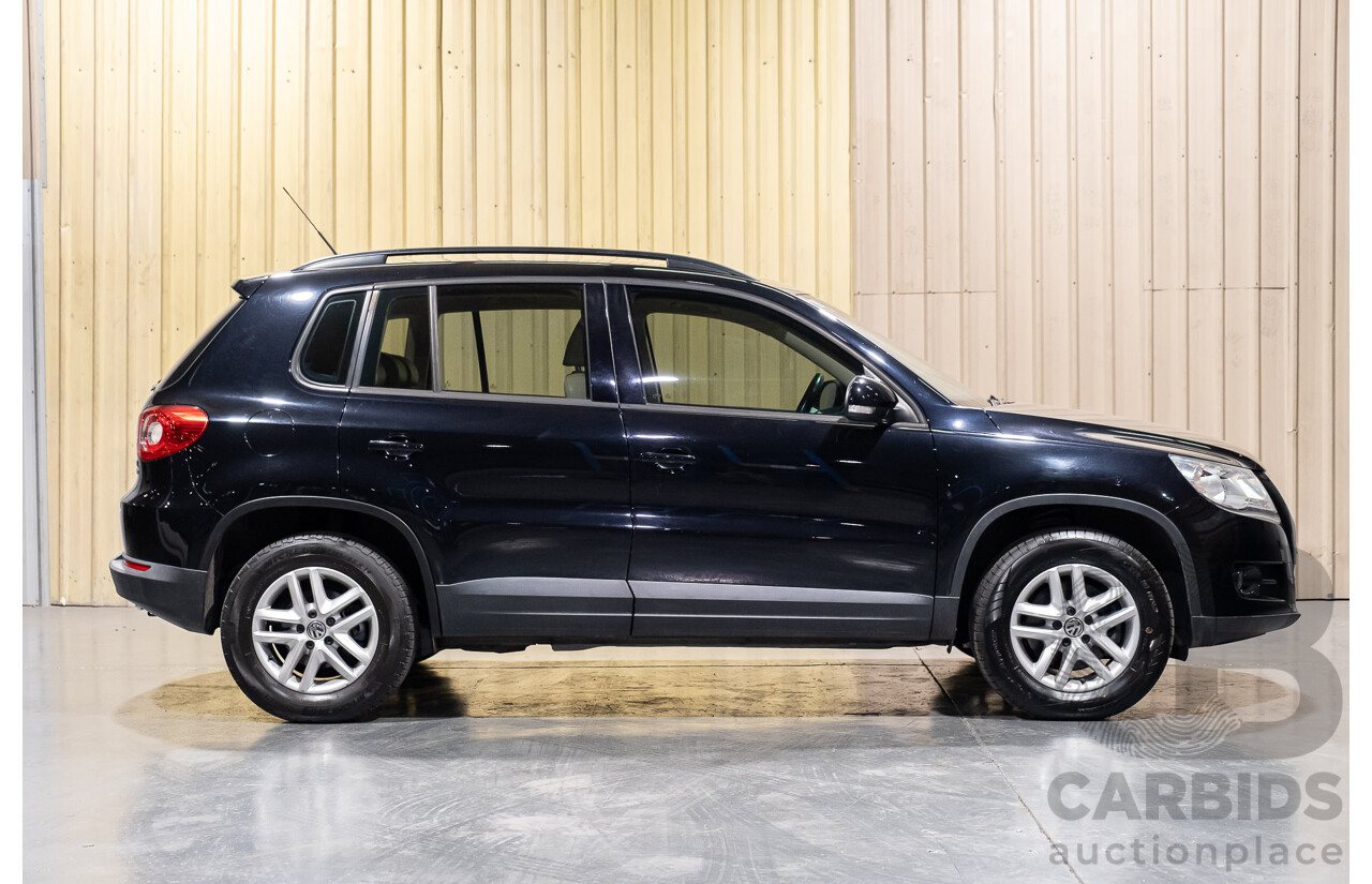 1/2011 Volkswagen Tiguan 125 TSI 4Motion (4x4) 5NC MY11 4d Wagon Black Turbo 2.0L