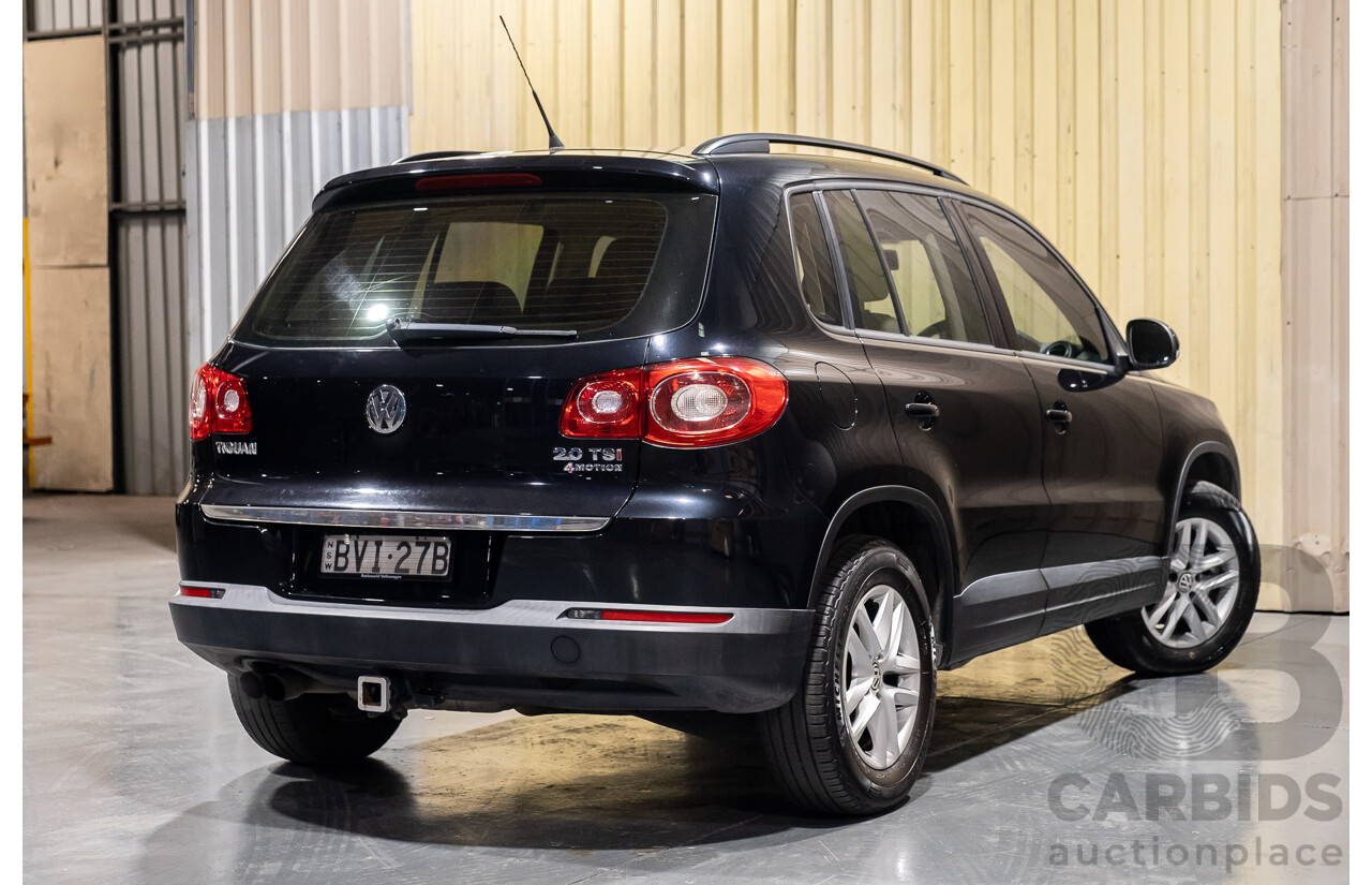 1/2011 Volkswagen Tiguan 125 TSI 4Motion (4x4) 5NC MY11 4d Wagon Black Turbo 2.0L