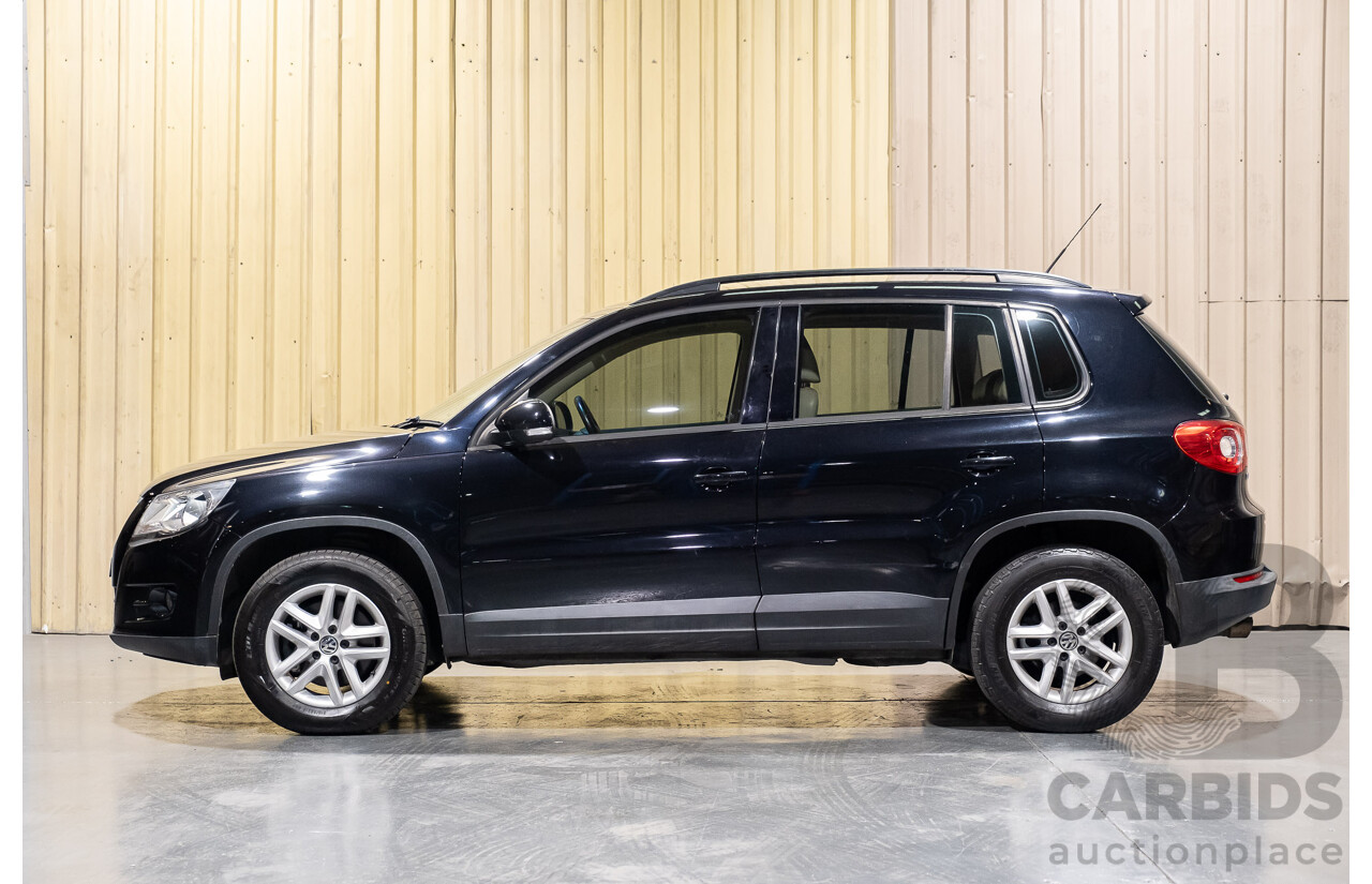 1/2011 Volkswagen Tiguan 125 TSI 4Motion (4x4) 5NC MY11 4d Wagon Black Turbo 2.0L