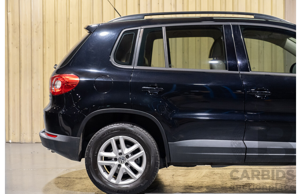 1/2011 Volkswagen Tiguan 125 TSI 4Motion (4x4) 5NC MY11 4d Wagon Black Turbo 2.0L