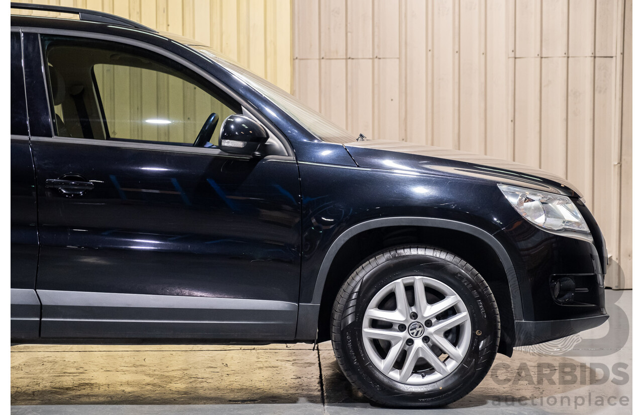 1/2011 Volkswagen Tiguan 125 TSI 4Motion (4x4) 5NC MY11 4d Wagon Black Turbo 2.0L
