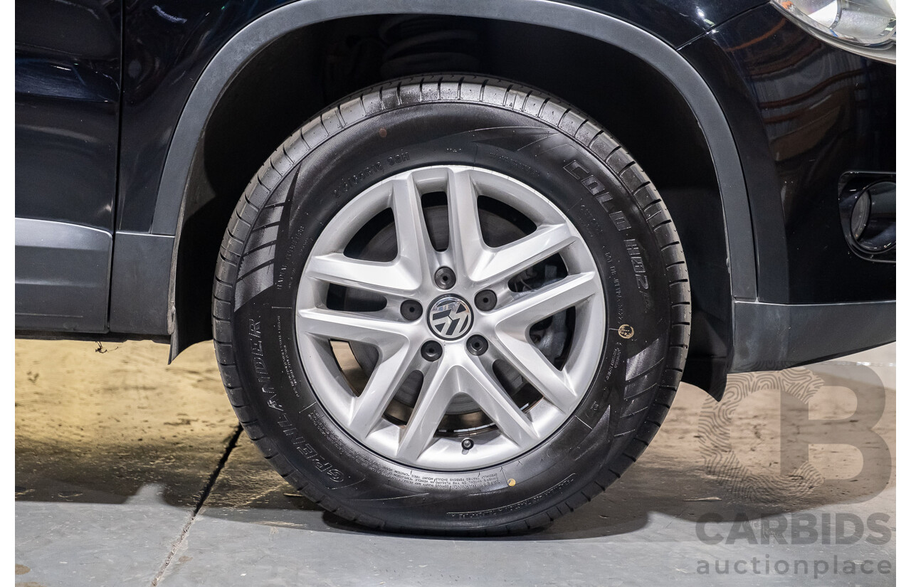 1/2011 Volkswagen Tiguan 125 TSI 4Motion (4x4) 5NC MY11 4d Wagon Black Turbo 2.0L