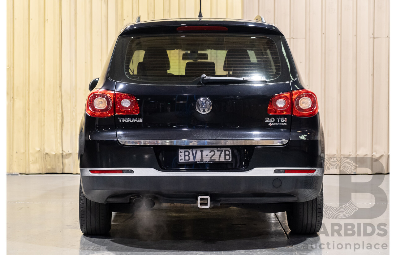 1/2011 Volkswagen Tiguan 125 TSI 4Motion (4x4) 5NC MY11 4d Wagon Black Turbo 2.0L
