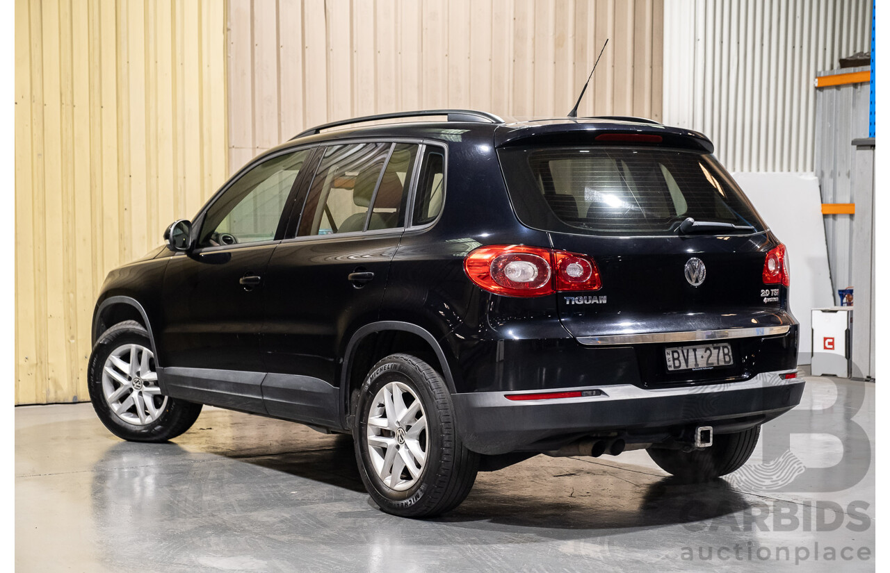 1/2011 Volkswagen Tiguan 125 TSI 4Motion (4x4) 5NC MY11 4d Wagon Black Turbo 2.0L