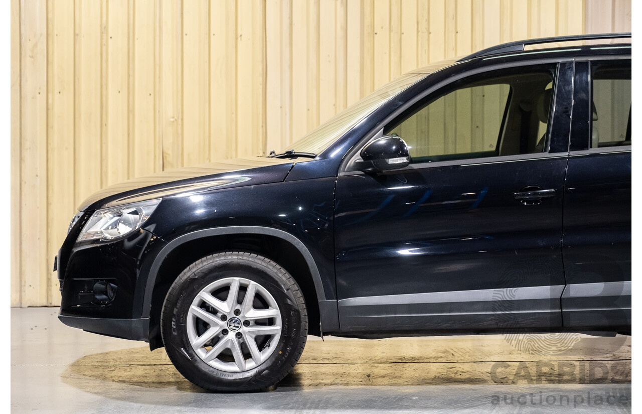 1/2011 Volkswagen Tiguan 125 TSI 4Motion (4x4) 5NC MY11 4d Wagon Black Turbo 2.0L