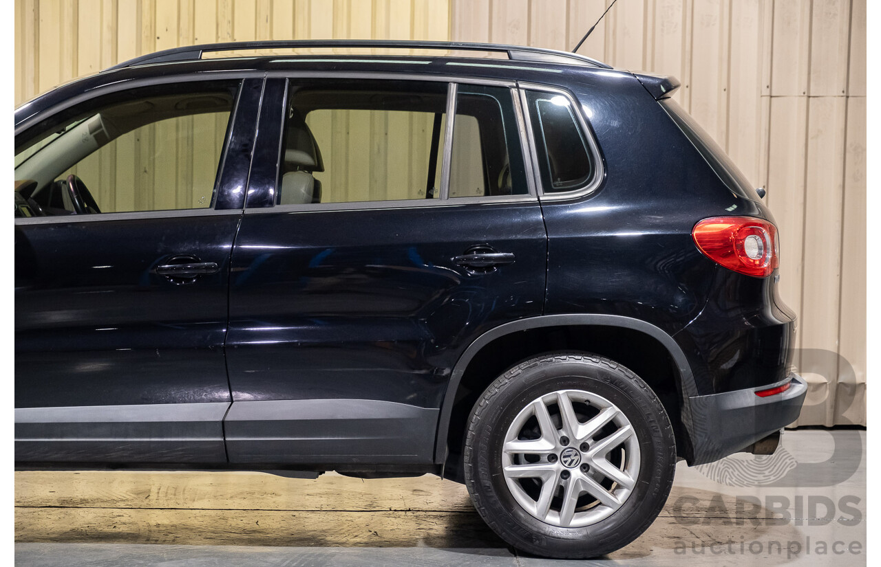 1/2011 Volkswagen Tiguan 125 TSI 4Motion (4x4) 5NC MY11 4d Wagon Black Turbo 2.0L