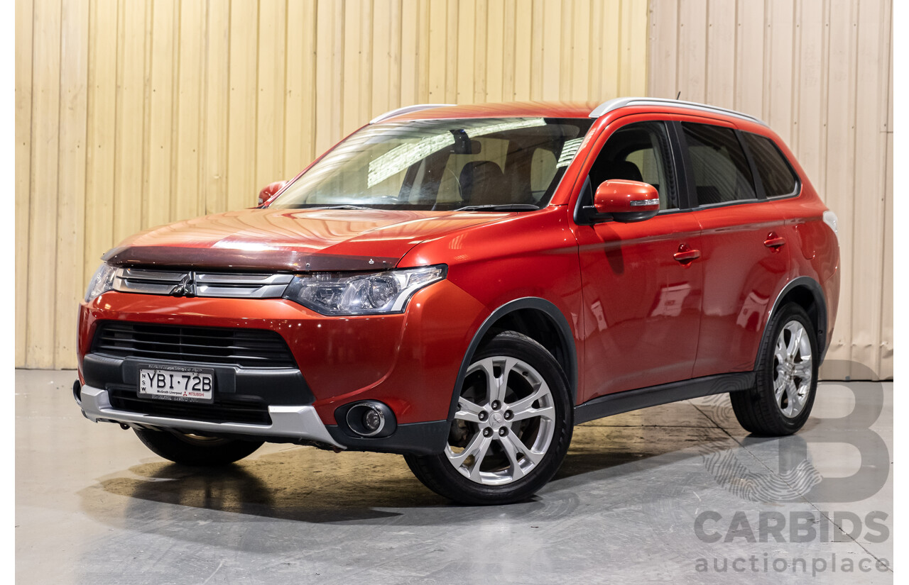 5/2014 Mitsubishi Outlander LS (4x4) ZJ MY14 4d Wagon Red Turbo Diesel 2.3L - 7 Seater