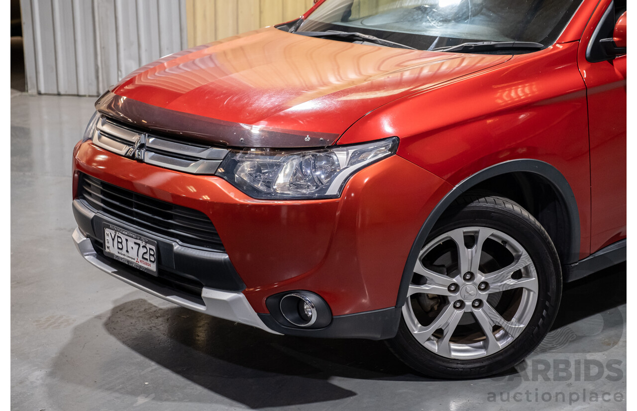 5/2014 Mitsubishi Outlander LS (4x4) ZJ MY14 4d Wagon Red Turbo Diesel 2.3L - 7 Seater