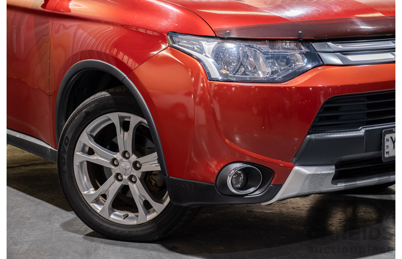 5/2014 Mitsubishi Outlander LS (4x4) ZJ MY14 4d Wagon Red Turbo Diesel 2.3L - 7 Seater