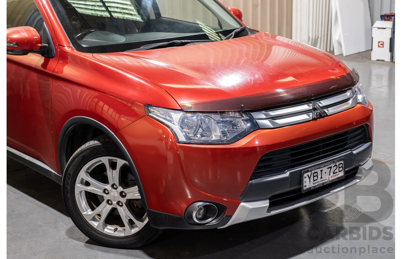 5/2014 Mitsubishi Outlander LS (4x4) ZJ MY14 4d Wagon Red Turbo Diesel 2.3L - 7 Seater