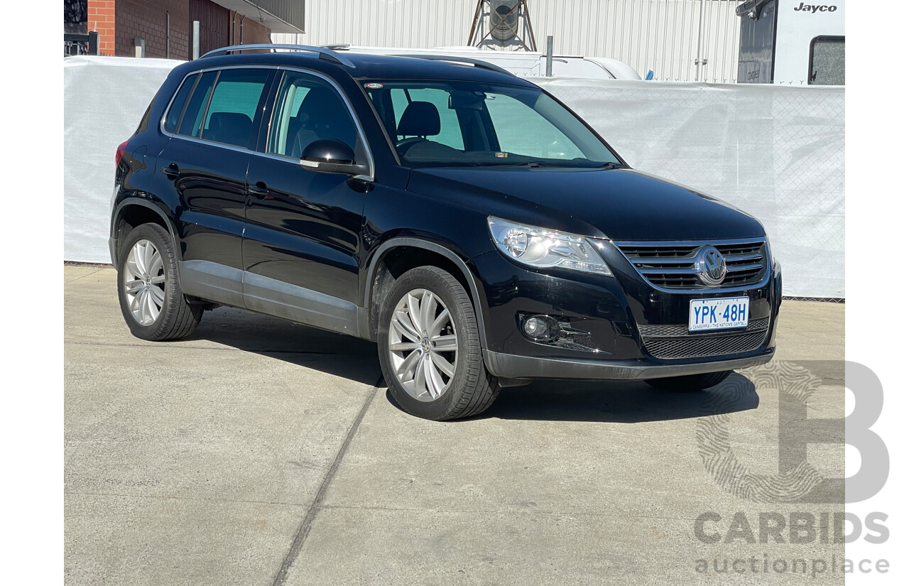 2/2010 Volkswagen Tiguan 147 TSI 5NC MY10 4d Wagon Black 2.0L