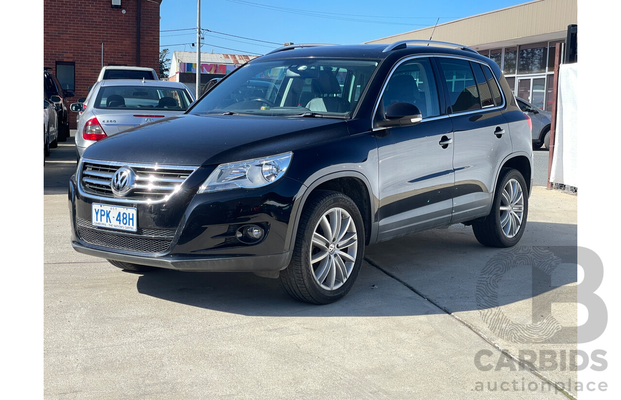 2/2010 Volkswagen Tiguan 147 TSI 5NC MY10 4d Wagon Black 2.0L