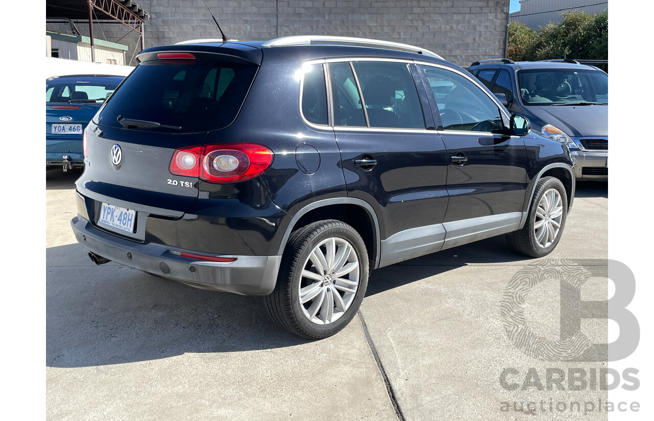 2/2010 Volkswagen Tiguan 147 TSI 5NC MY10 4d Wagon Black 2.0L