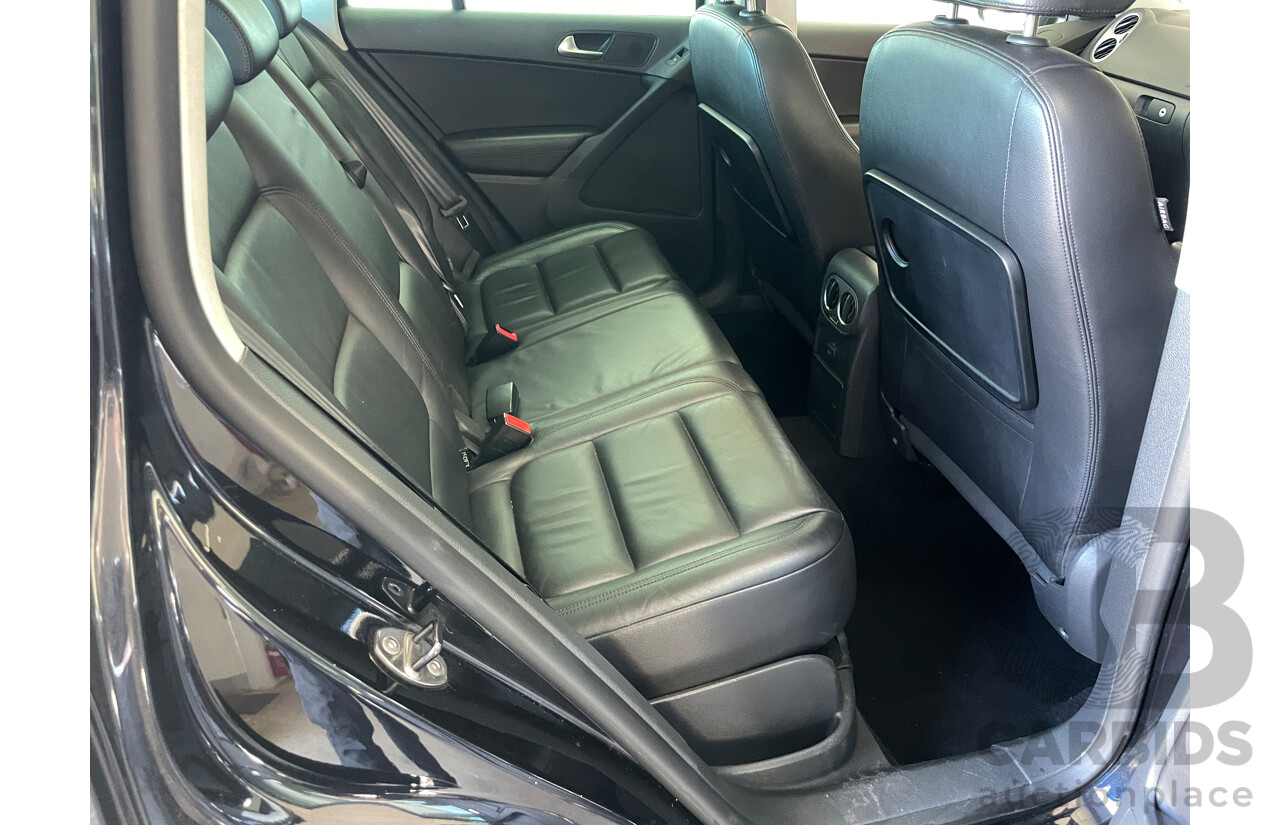 2/2010 Volkswagen Tiguan 147 TSI 5NC MY10 4d Wagon Black 2.0L