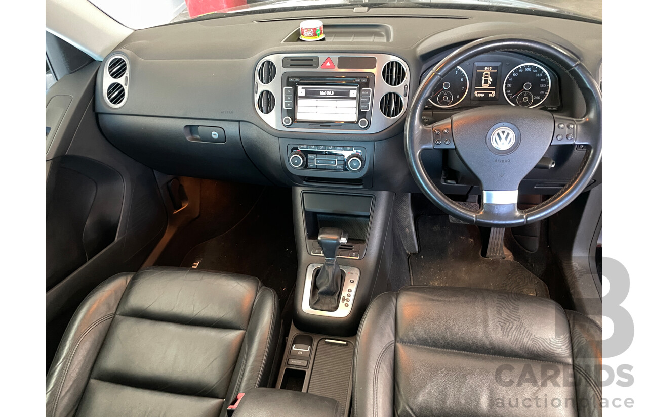 2/2010 Volkswagen Tiguan 147 TSI 5NC MY10 4d Wagon Black 2.0L