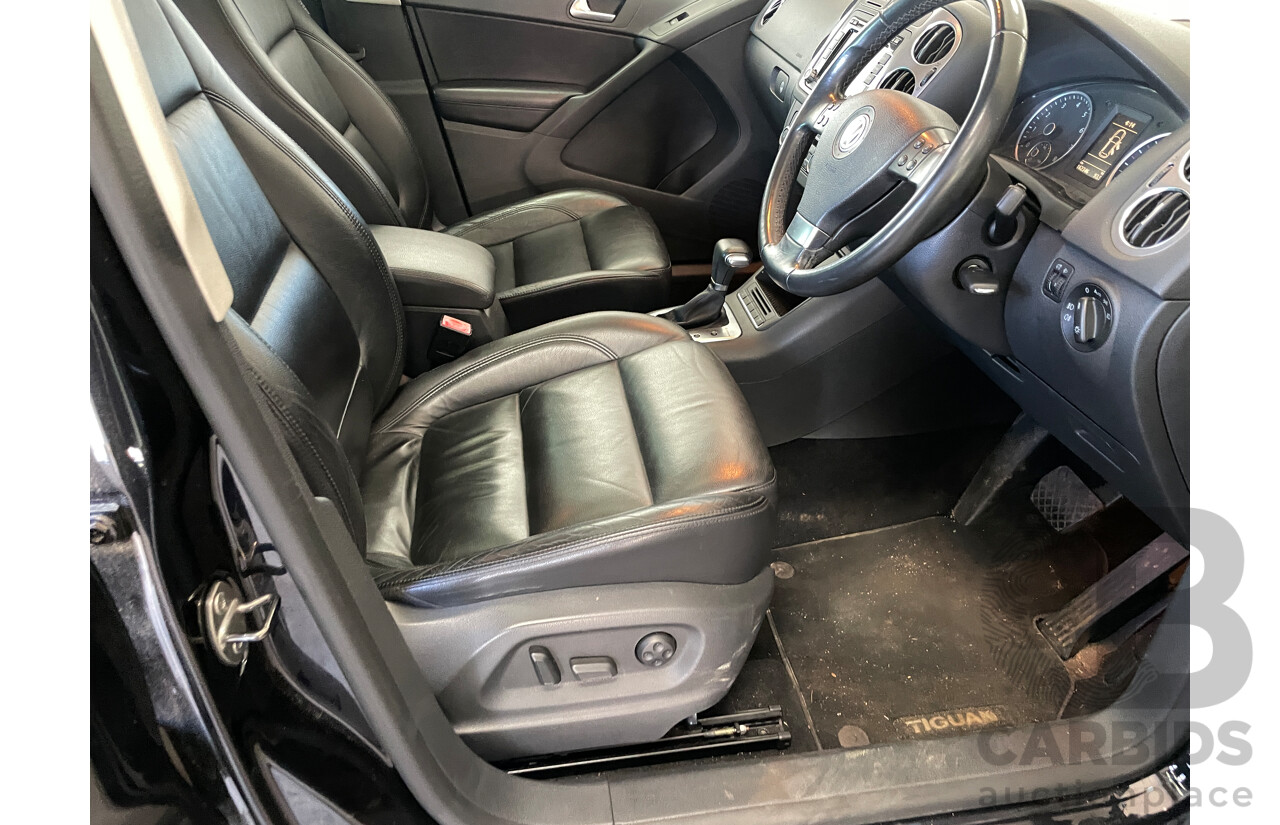 2/2010 Volkswagen Tiguan 147 TSI 5NC MY10 4d Wagon Black 2.0L