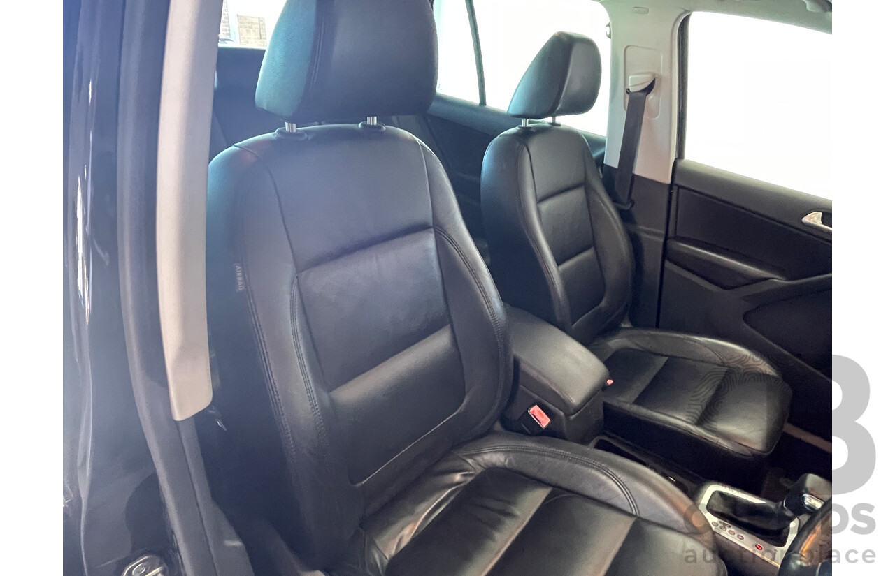 2/2010 Volkswagen Tiguan 147 TSI 5NC MY10 4d Wagon Black 2.0L