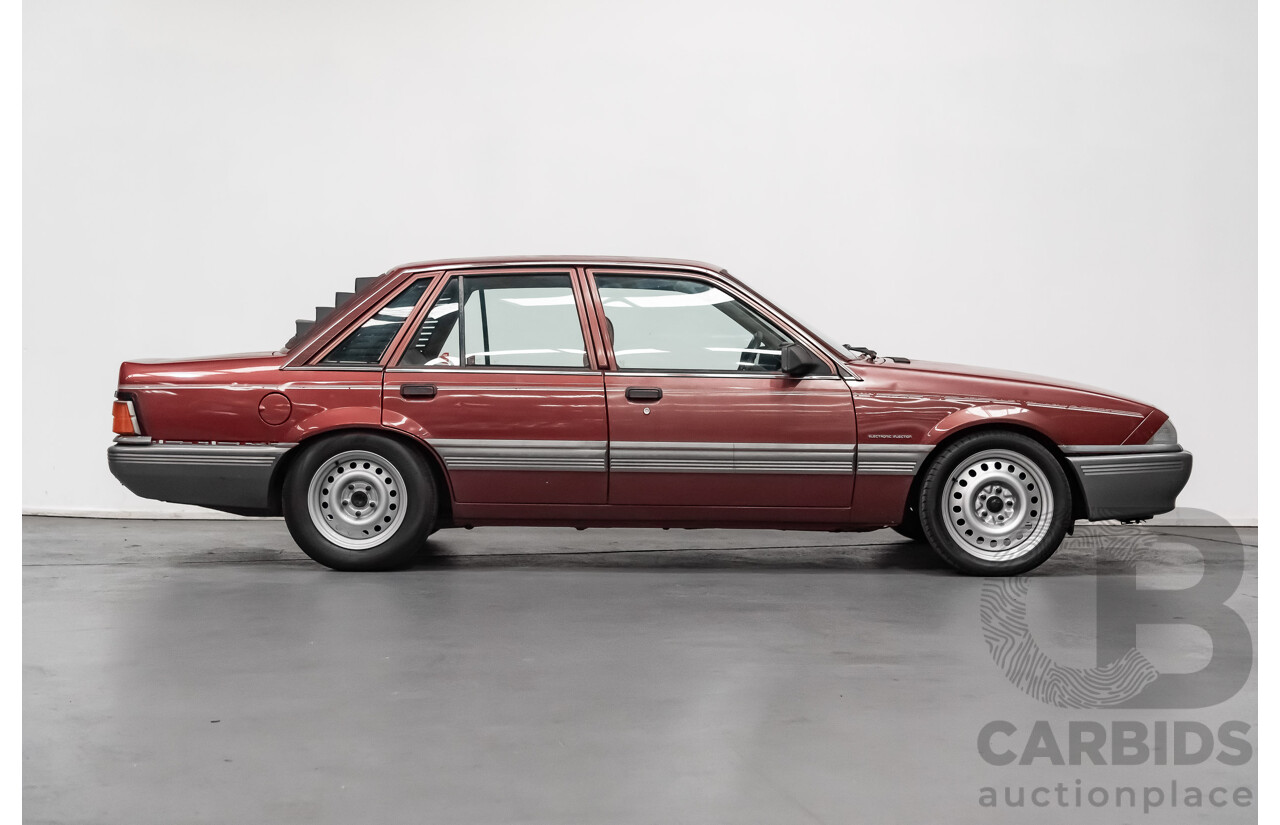 10/1986 Holden Commodore Executive VL 4d Sedan Maroon Turbo 2.5L - Modified