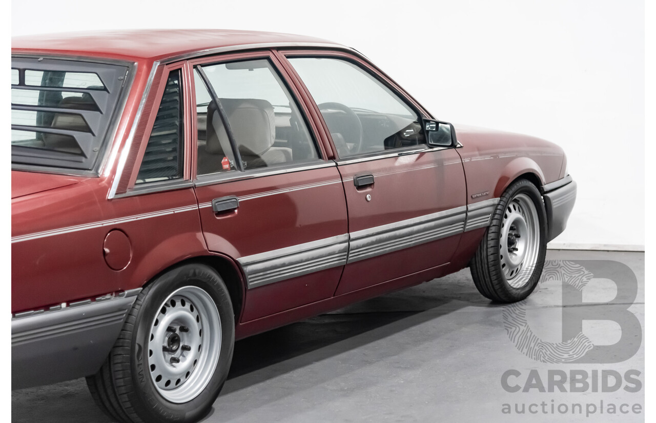 10/1986 Holden Commodore Executive VL 4d Sedan Maroon Turbo 2.5L - Modified