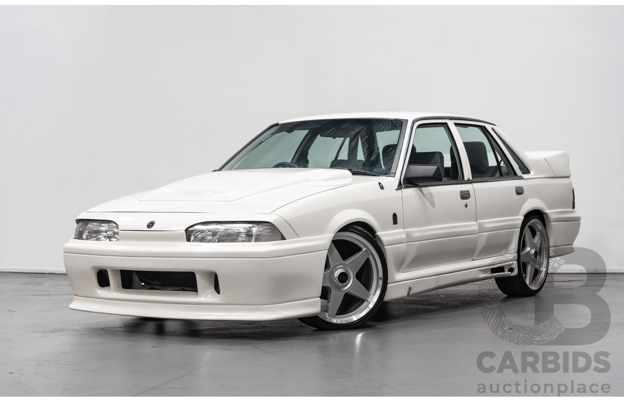 10/1986 Holden Commodore Executive VL 4d Sedan White 5.0L V8 - Walkinshaw Group A SS Tribute