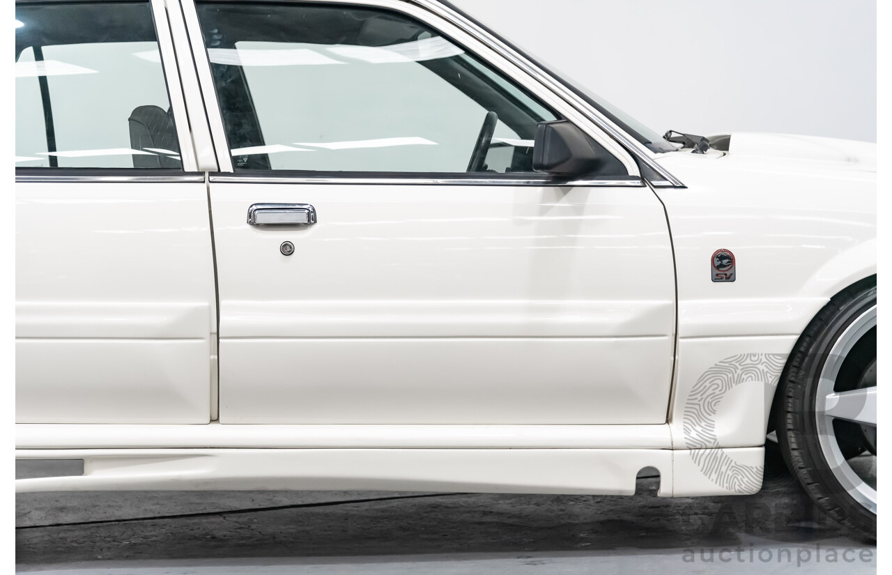 10/1986 Holden Commodore Executive VL 4d Sedan White 5.0L V8 - Walkinshaw Group A SS Tribute