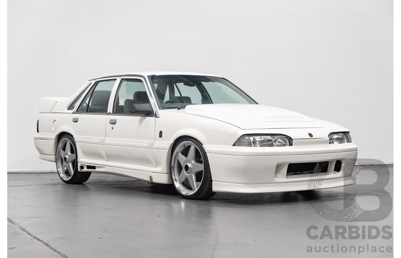 10/1986 Holden Commodore Executive VL 4d Sedan White 5.0L V8 - Walkinshaw Group A SS Tribute