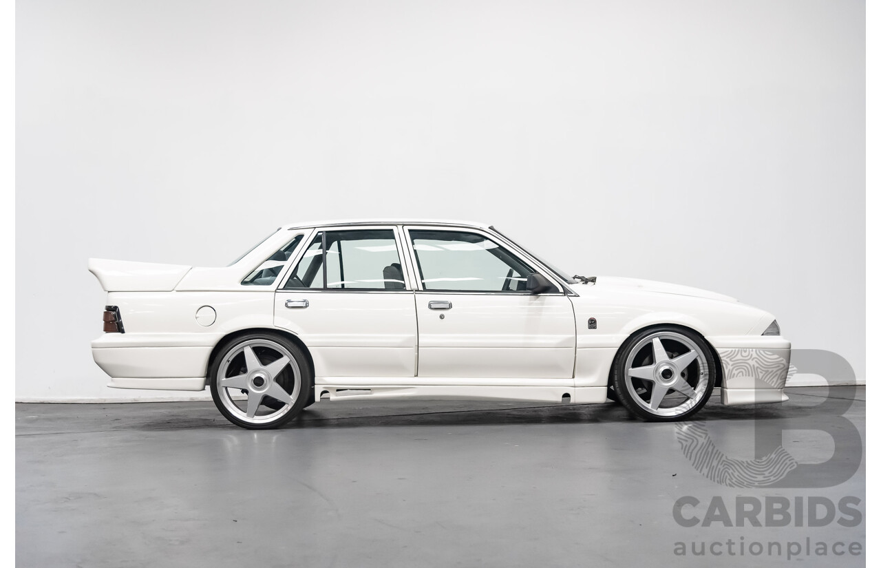 10/1986 Holden Commodore Executive VL 4d Sedan White 5.0L V8 - Walkinshaw Group A SS Tribute