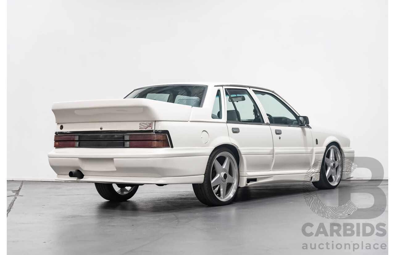 10/1986 Holden Commodore Executive VL 4d Sedan White 5.0L V8 - Walkinshaw Group A SS Tribute