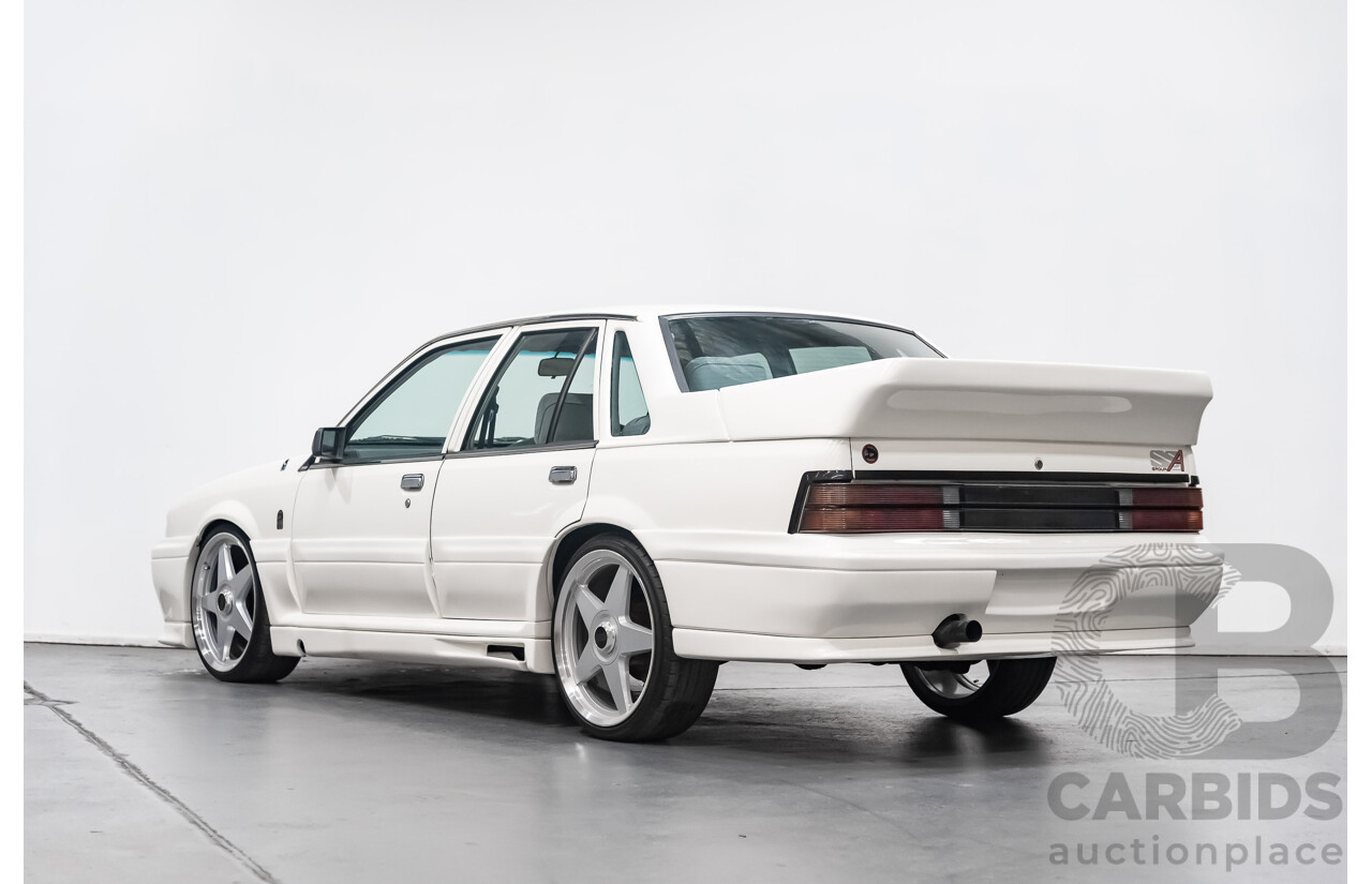 10/1986 Holden Commodore Executive VL 4d Sedan White 5.0L V8 - Walkinshaw Group A SS Tribute