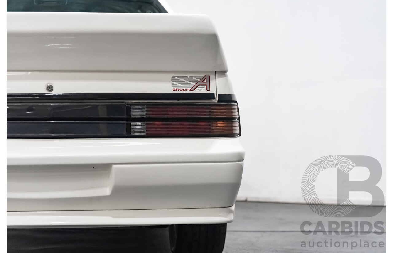 10/1986 Holden Commodore Executive VL 4d Sedan White 5.0L V8 - Walkinshaw Group A SS Tribute