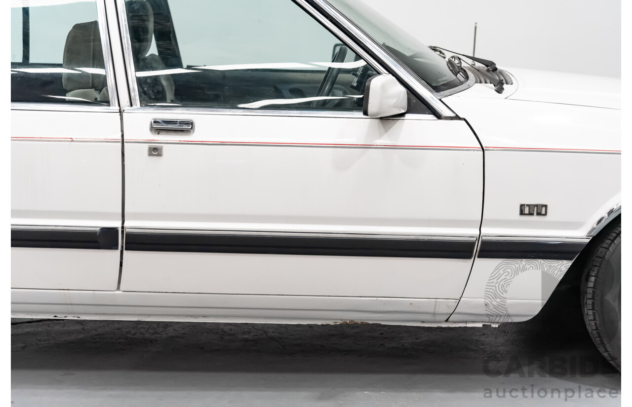 9/1987 Ford LTD  FE 4d Sedan White 4.0L