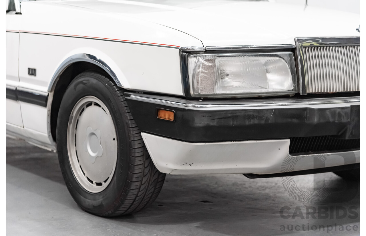 9/1987 Ford LTD  FE 4d Sedan White 4.0L