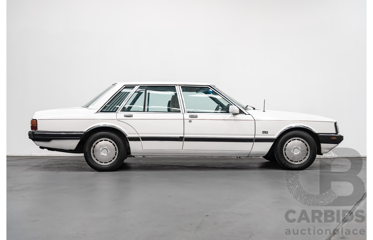 9/1987 Ford LTD  FE 4d Sedan White 4.0L