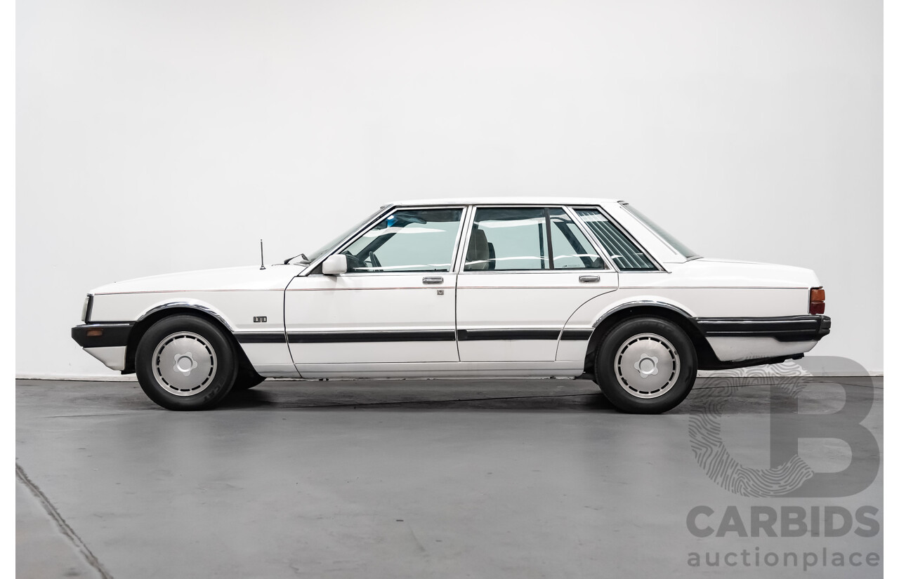 9/1987 Ford LTD  FE 4d Sedan White 4.0L