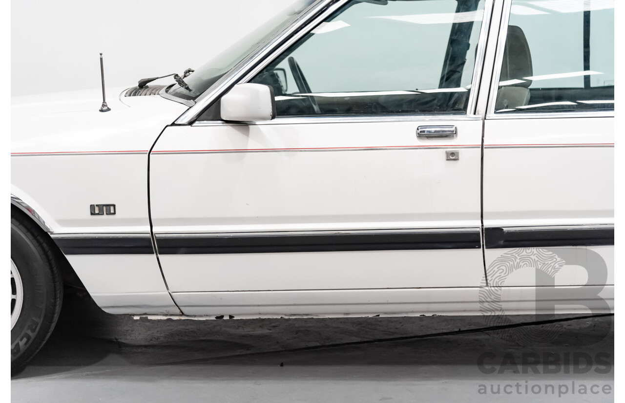 9/1987 Ford LTD  FE 4d Sedan White 4.0L