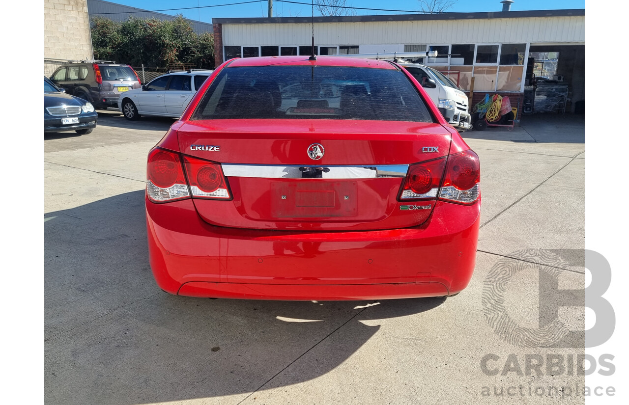 7/2010 Holden Cruze CDX JG 4d Sedan Red 2.0L