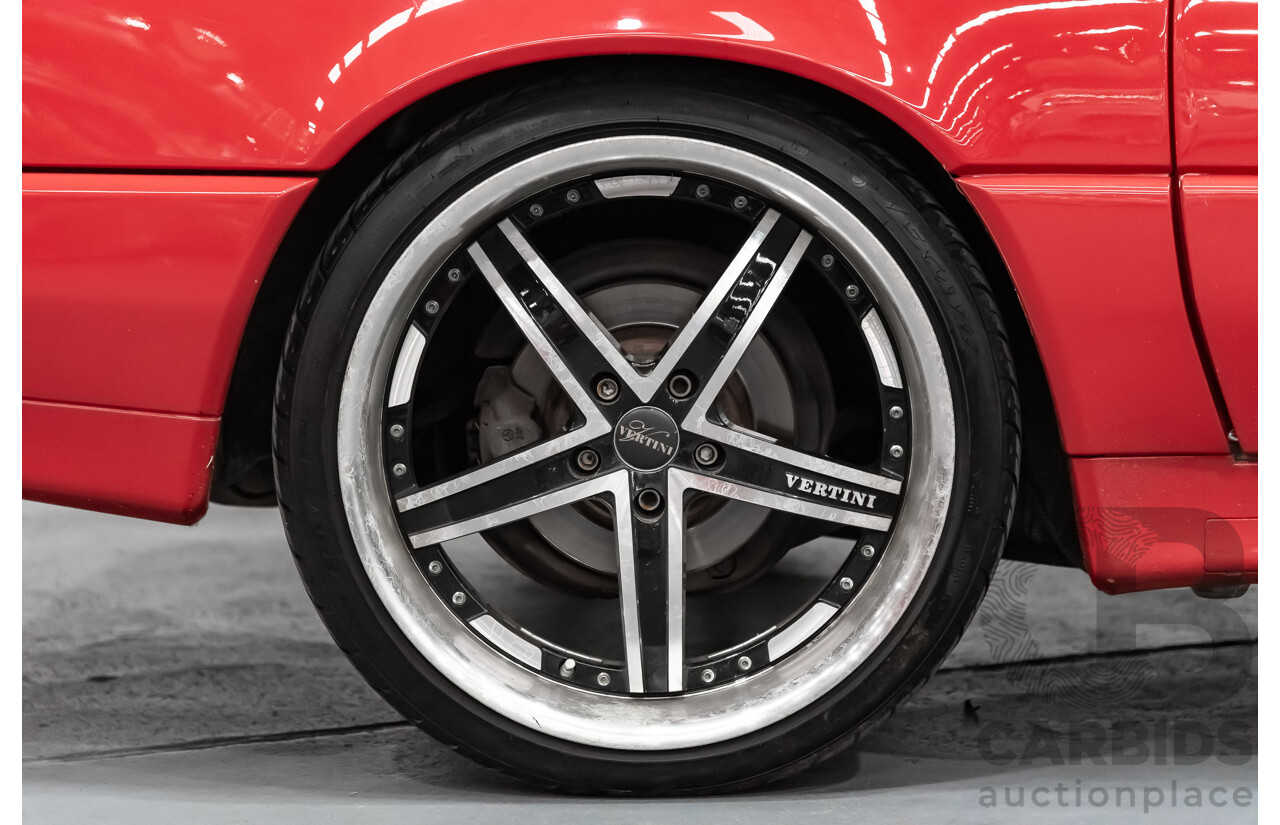 7/1990 Mercedes-Benz 500 SL  2d Convertible Red 5.0L V8