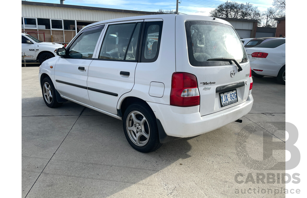 8/2000 Mazda 121 Metro Shades  5d Hatchback White 1.3L