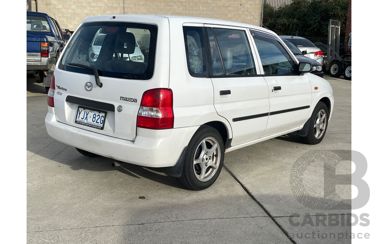 8/2000 Mazda 121 Metro Shades  5d Hatchback White 1.3L