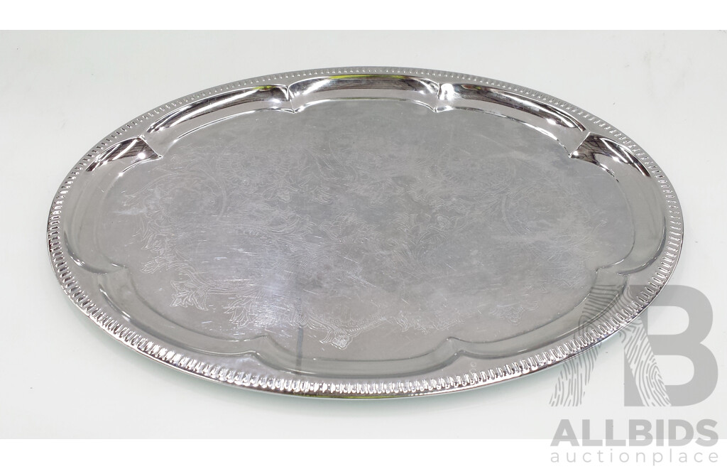 Three Stainless Steel Serving Trays and Two Jugs